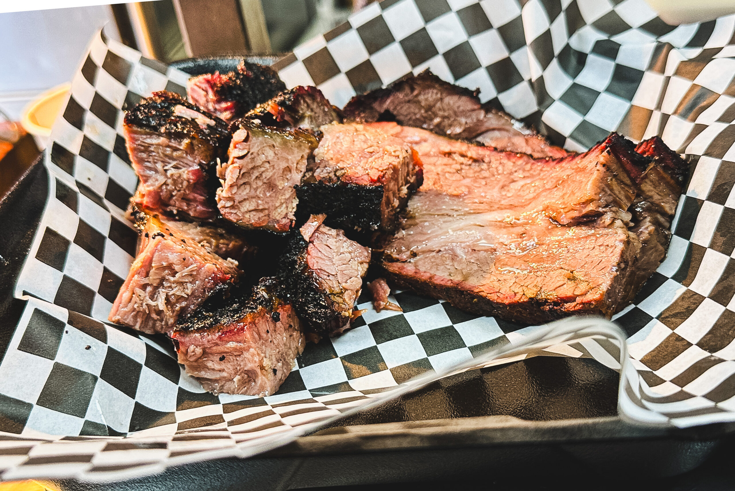 Sliced Fire Craft prime brisket with a dark bark